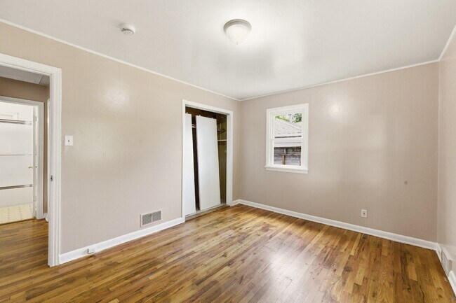 Building Photo - Four Bedroom Home In Aurora - ready ASAP. Brand New Paint Top to Bottom, with updated flooring!