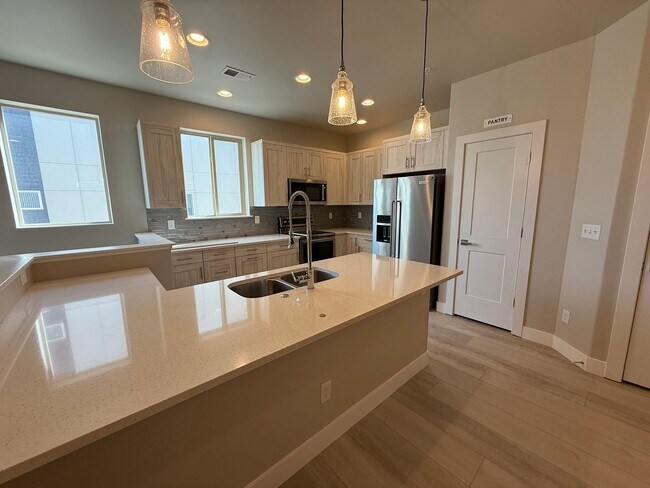 Building Photo - Modern Townhouse with Rooftop Deck & Mountain Views Near Sloan’s Lake!!