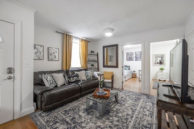 Building Photo - Spacious and updated 3-bedroom condo just 2 blocks from Airport T Station!