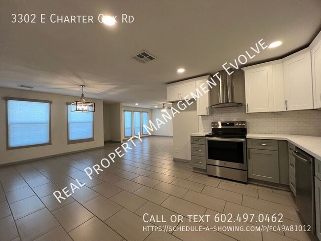 Building Photo - 3302 E Charter Oak Rd