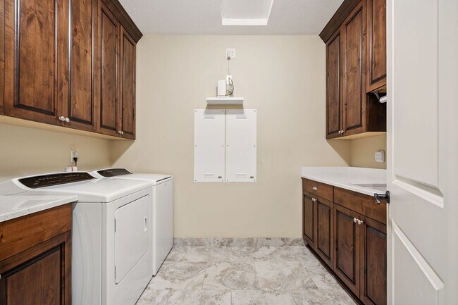 Building Photo - 2 Creeks Condominiums - Gated Community on...