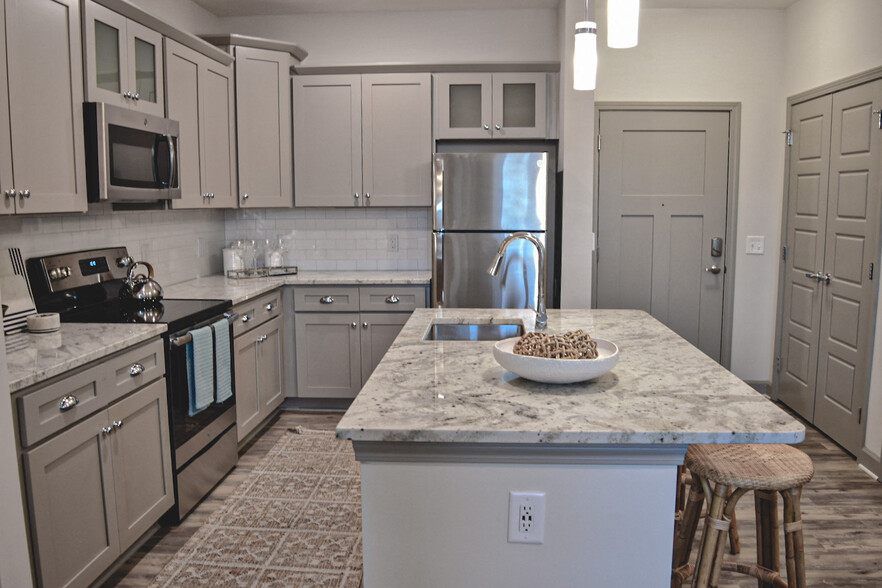 Designer Kitchen with Custom Cabinetry and Granite Counters - Hawthorne at Smith Creek