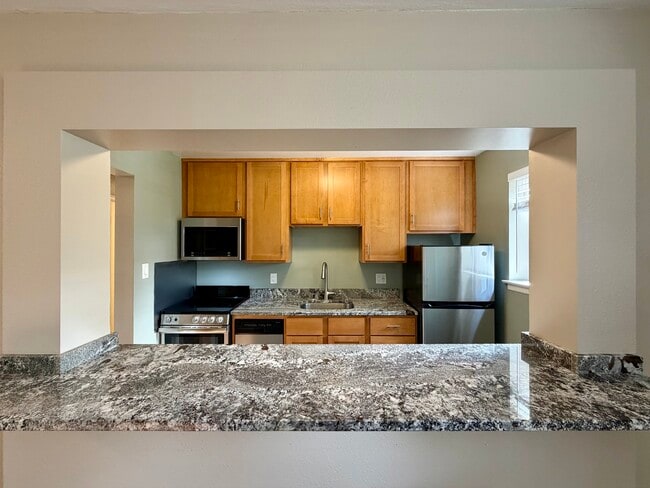 2BR,1BA - 625SF - Unit 10 - Breakfast Bar - 2333 Priscilla St of In the City Apartments