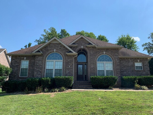 Building Photo - Luxury Living! Beautiful Brick Home in Sango with 3 car garage.