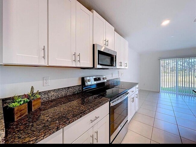 Building Photo - 6557 Bar S Bar Trl