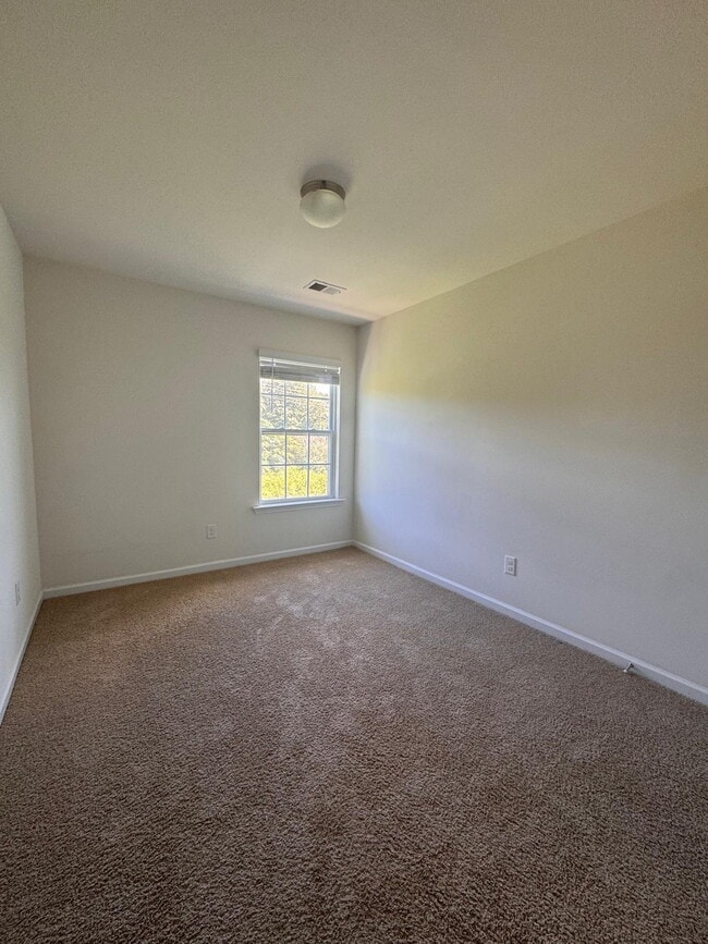 Building Photo - Modern 3-Bedroom Multiplex with 3 Full Bat...