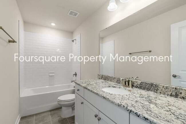 Building Photo - 4 Bedroom Home with 2nd Floor Loft- Kitchen Island & 2-Car Garage – Convenient Raleigh Location