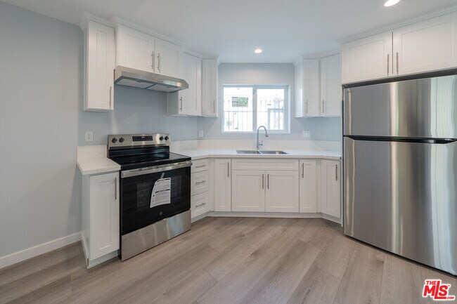 Building Photo - 5835 Cartwright Ave