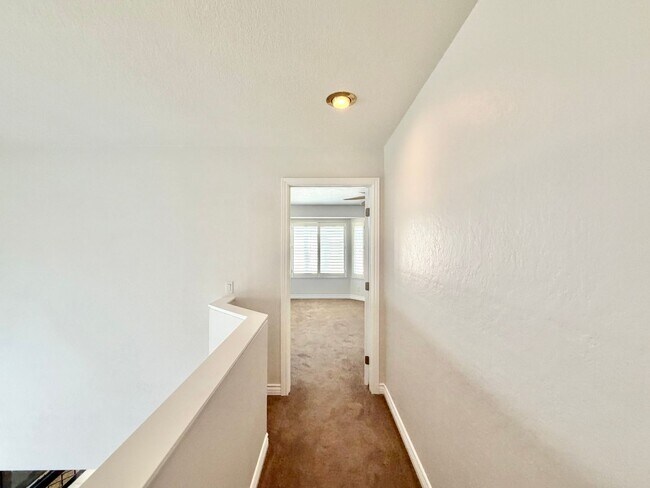 Building Photo - Open-Concept 3 Bedroom 2.5 Bathroom Home with Soaring Ceilings & Spacious Backyard