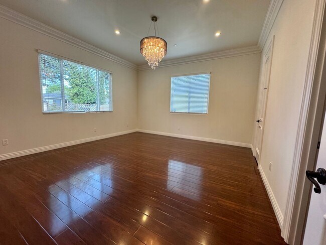 Building Photo - Peaceful North Hollywood street, charming three-bedroom, three-bathroom residence