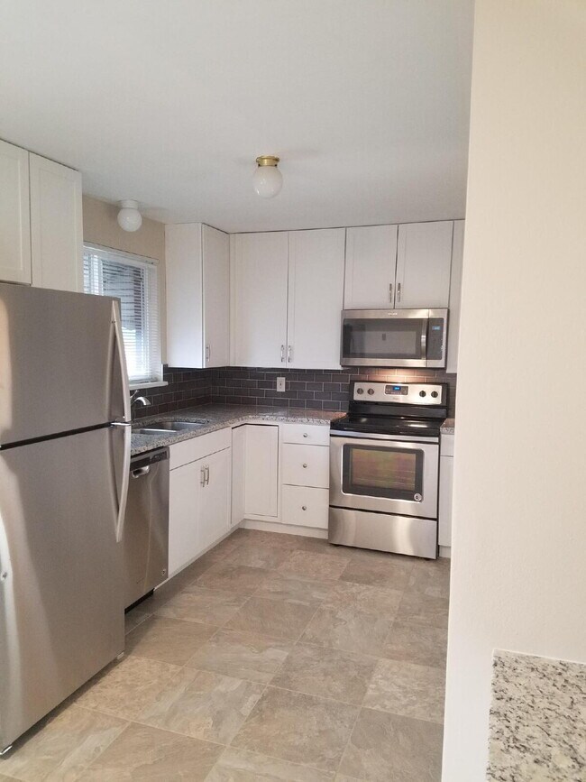 Building Photo - ***COMING SOON***  Spacious 4-Bedroom Wheat Ridge Home with Finished Garden Level and Two-Car Garage
