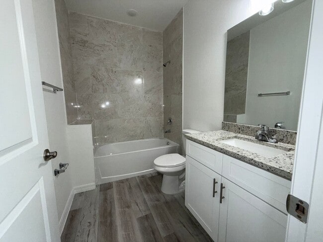 Building Photo - New Construction Suite! 1/1 Side entry uni...