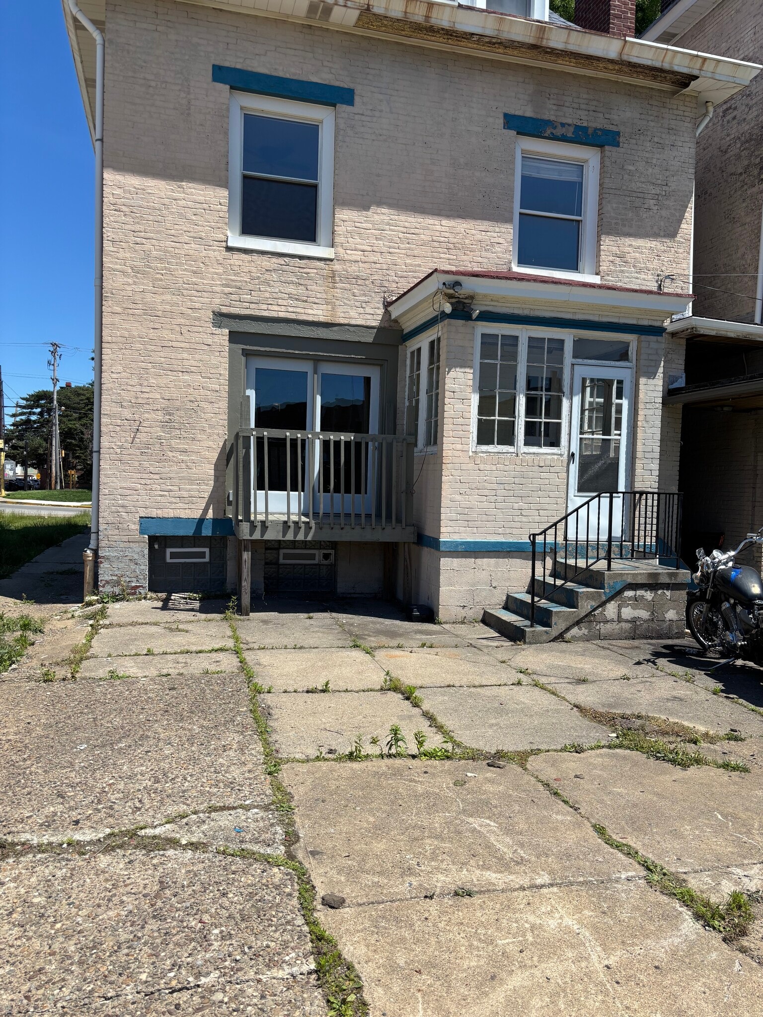Back of house with small deck - 4738 Friendship Ave