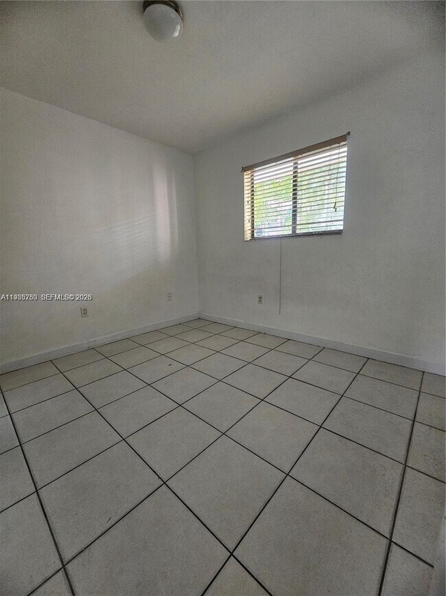 Building Photo - 5460 W 21st Ct