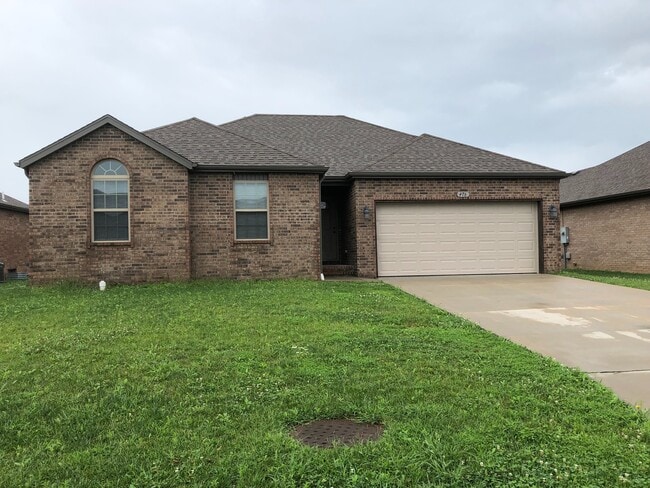 Building Photo - Beautiful all brick, 3-bedroom Republic Home