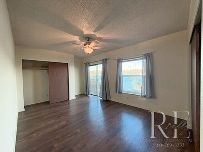 Building Photo - Waterfront Bliss: Stunning Puget Sound Views & Your Own Private Beach!