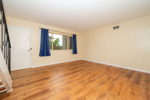 Building Photo - Two Weeks FREE Chula Vista Townhome 2 Bed 1 Bath with assigned parking, Refreshed w/prime amenities.
