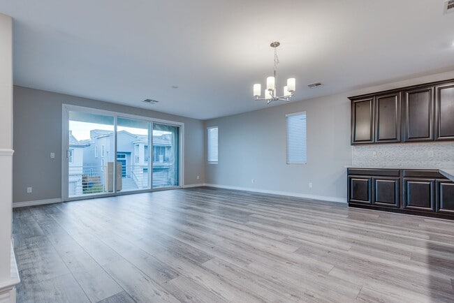 Building Photo - Like new, split-level, 3 bed, 2.5 bath, with bonus room & Strip views in West Las Vegas!