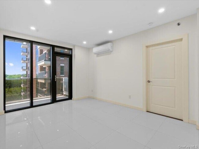 Building Photo - 124-28 Queens Blvd