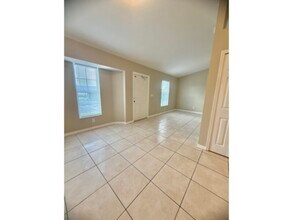 Building Photo - App.Fees Reimbursed AFTER Move-In! Available Mid-April! 2 Bed 2 Bath Located SE Cape Coral