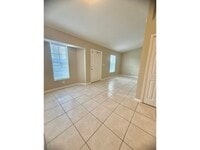 Building Photo - App.Fees Reimbursed AFTER Move-In! Available Mid-April! 2 Bed 2 Bath Located SE Cape Coral
