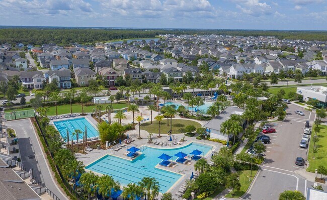 Building Photo - Luxury 4-Bedroom Townhome in Laureate Park – Now Available!