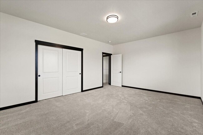 Building Photo - Spacious 4-Bedroom, 2.5 Bath, Two-Story Gem with a Fenced Yard!