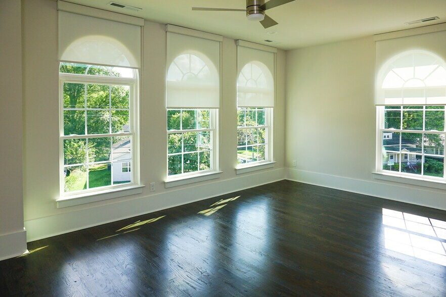 Four stunning windows provide spectacular light and will have shades for privacy. - 1003 Parkwood Ave