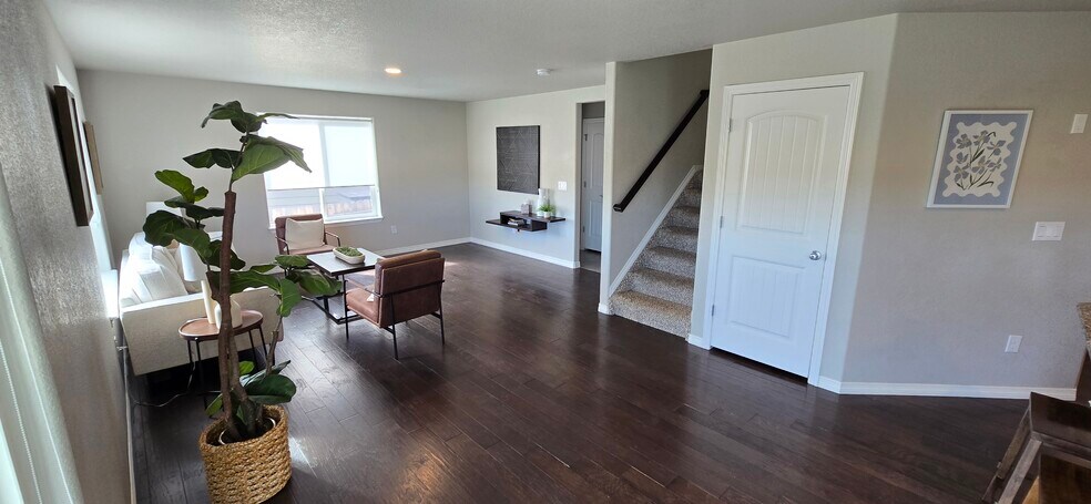 Living room, stairs up and down - 6081 Anders Ridge Ln