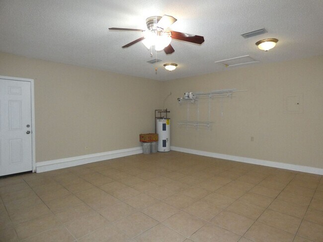 Building Photo - Spacious 3-Bedroom Home — Large Backyard