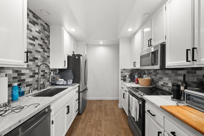 Building Photo - Tastefully Remodeled Two Bed, Two Bath End...