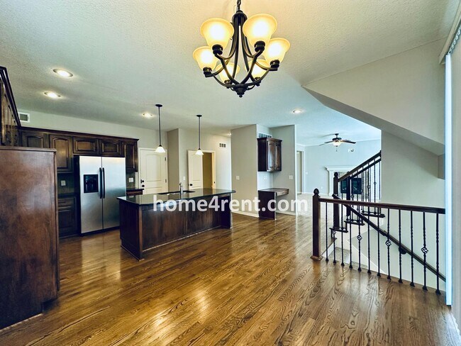 Building Photo - Gorgeous Olathe, 5 BR Home w/ Wood floors,...