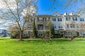 Building Photo - Belmont Bay Beauty! Three level two car ga...