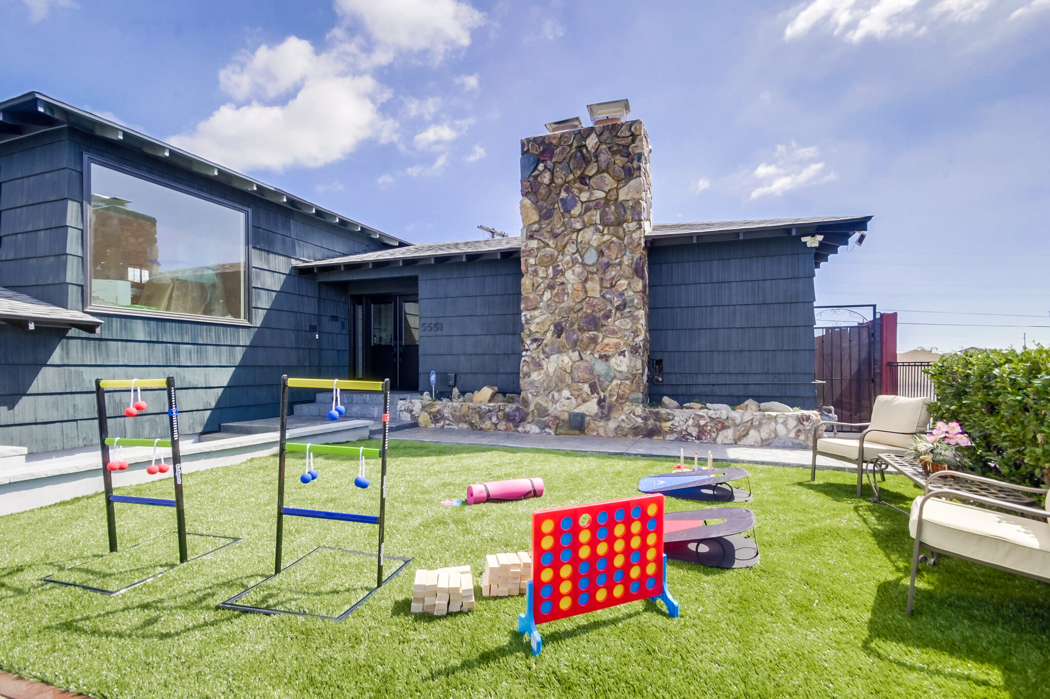 Here are life-sized outdoor games & comfy seats as you sip drinks while watching the children. - 5551 Churchward St