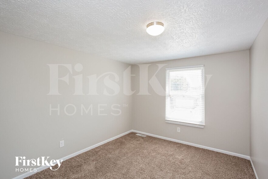 Building Photo - 8053 Harvest Ln