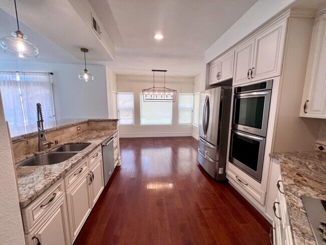 Building Photo - Coming Soon! Stunning 4 bedroom Redhawk ho...