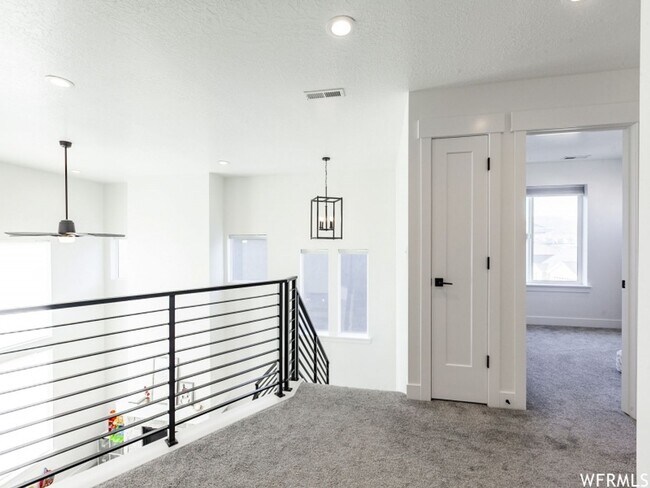 Building Photo - Spacious Open Floor Plan Available Soon!