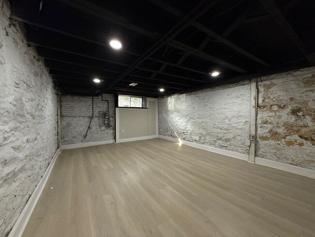 Building Photo - Modern 3BR Rowhome with Finished Lower Level & Rear Deck