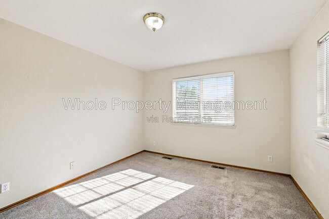 Building Photo - 3189 E 106th Ave