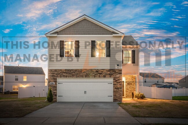 Building Photo - "JUST REDUCED - Charming Four Bedroom Retr...