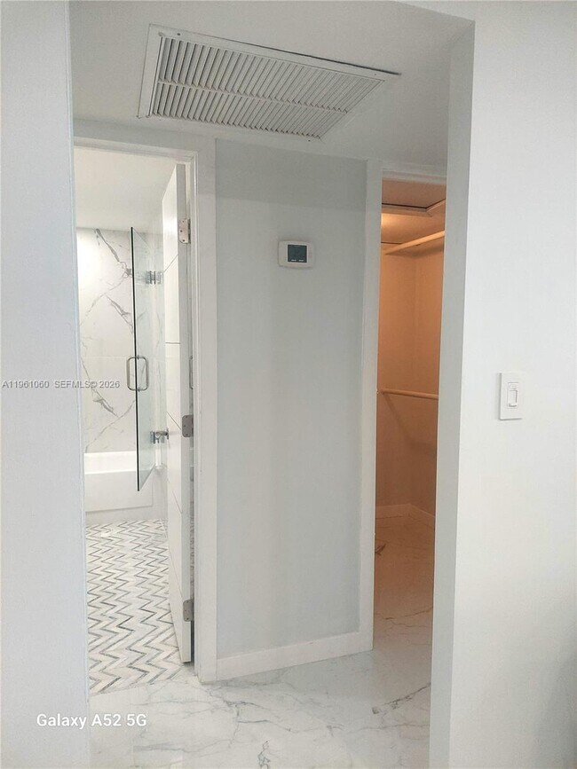 Building Photo - 5005 Collins Ave