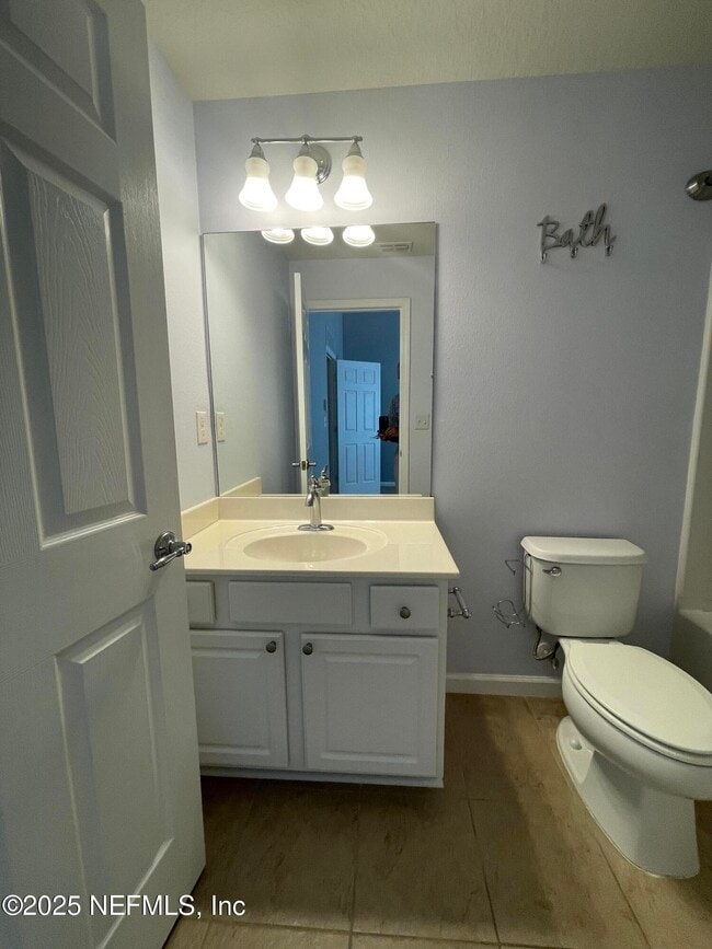 Building Photo - 6937 Woody Vine Dr