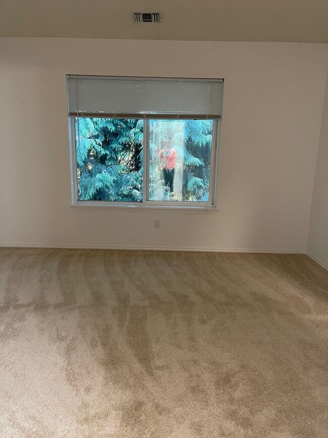 Building Photo - Bright, Spacious, Updated Condo with Separ...