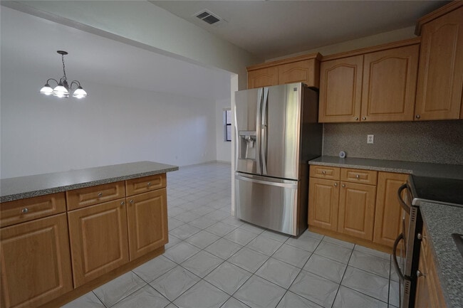 Building Photo - 6380 W 24th Ct