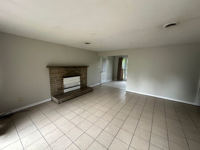 Building Photo - ONE LEVEL BRICK RANCHER WITH EXTRA LARGE LOT
