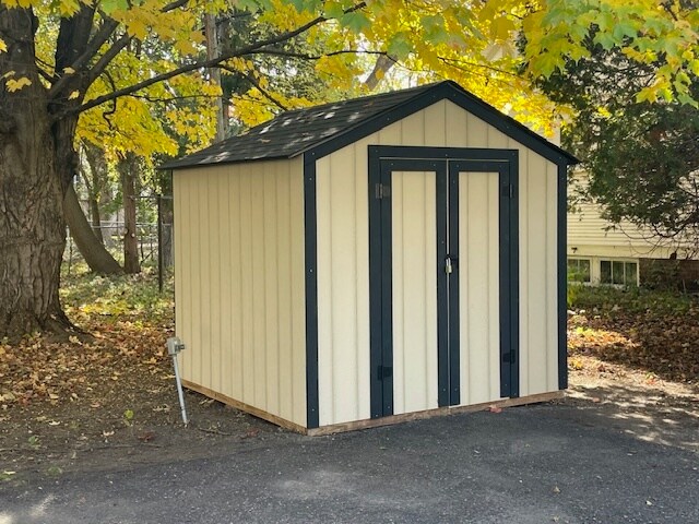 Storage shed on by parking pad - 1103 8th St E