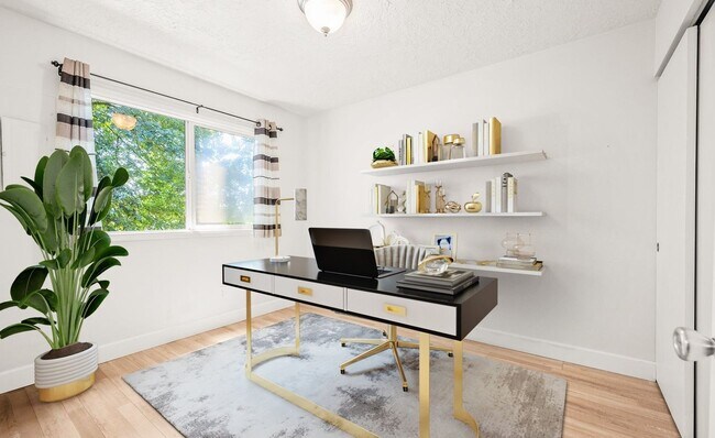 Building Photo - Spacious 2-Bedroom Condo with Forest Views, Private Balcony, In-Unit Laundry & Community Amenitie...