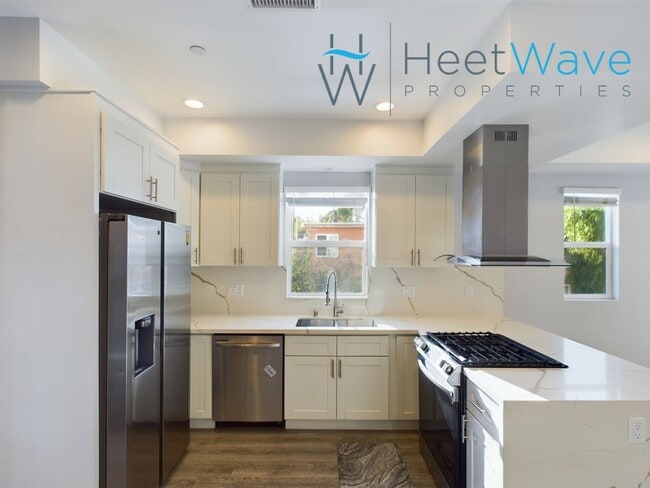 Building Photo - REZKO - E Street