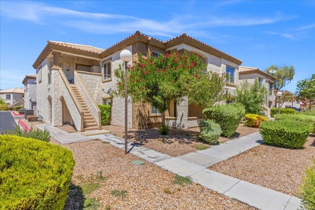 Building Photo - Sleek 2 Bedroom Condo with 2 Car Garage Ne...