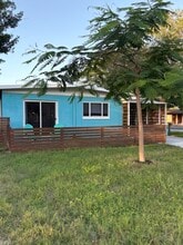 Building Photo - 7705 Poinsetta Ave